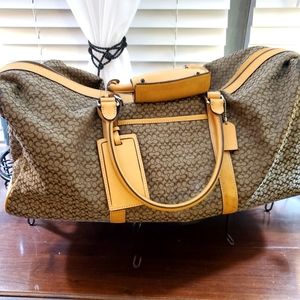 Coach travel bag with shoulder strap and keys